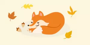 Herbstferienprogramm. Schlafender Fuchs umgeben von bunten Blättern und Nüssen
