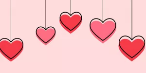 Bild zu Basteln am Valentinstag. Herzen, die von der Decke hängen